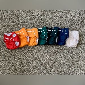 Nora’s Nursery Cloth Diapers- one size- pocket diapers- solid rainbow colors.
